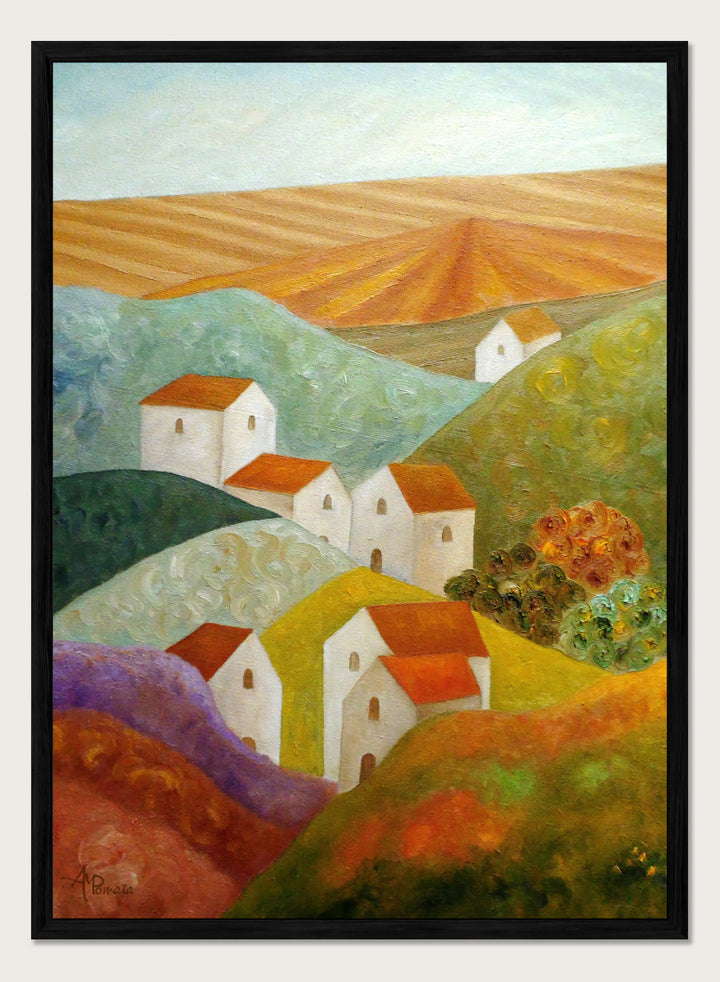 A colorful landscape painting featuring white houses with orange-red roofs nestled among rolling hills in shades of green, purple, yellow, and orange, with a plowed field under a pale sky in the background. Shop Colorful Hillside Village by Angeles M. Pomata, an autumn countryside art print featuring white houses, rolling hills, warm fields, and earthy color.