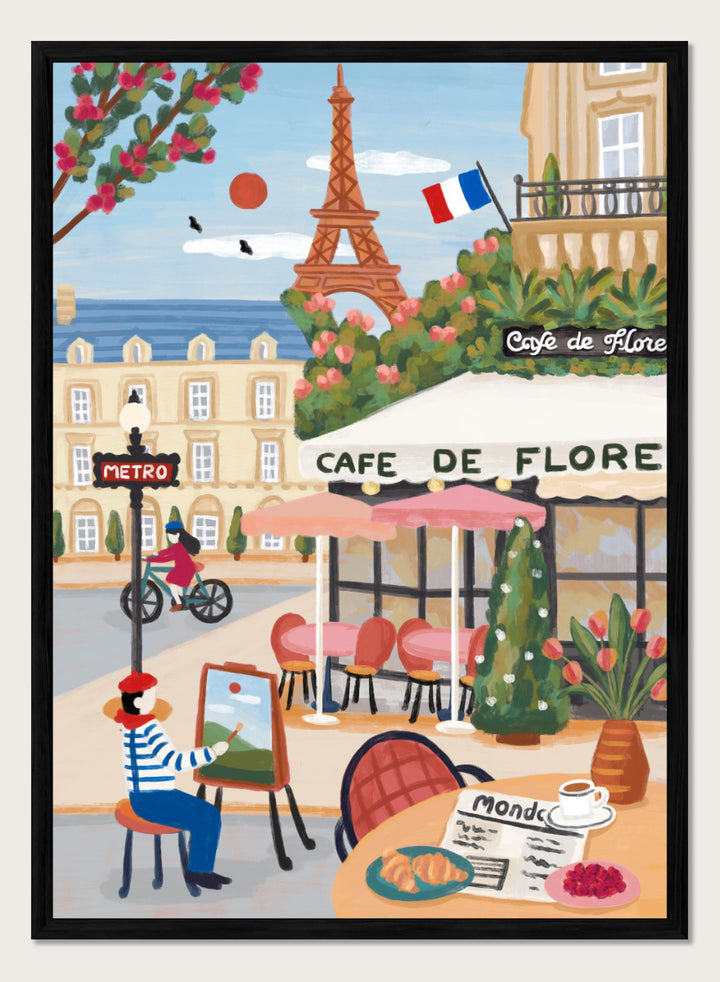 A colorful illustrated Paris street scene with the Eiffel Tower, a cafe exterior labeled Cafe de Flore, a cyclist, a seated painter, flowers, and a French flag. Shop Paris Cafe Life by Nidhi Kachhadiya, a colorful Paris wall art print inspired by French café culture, the Eiffel Tower, and charming European city life.