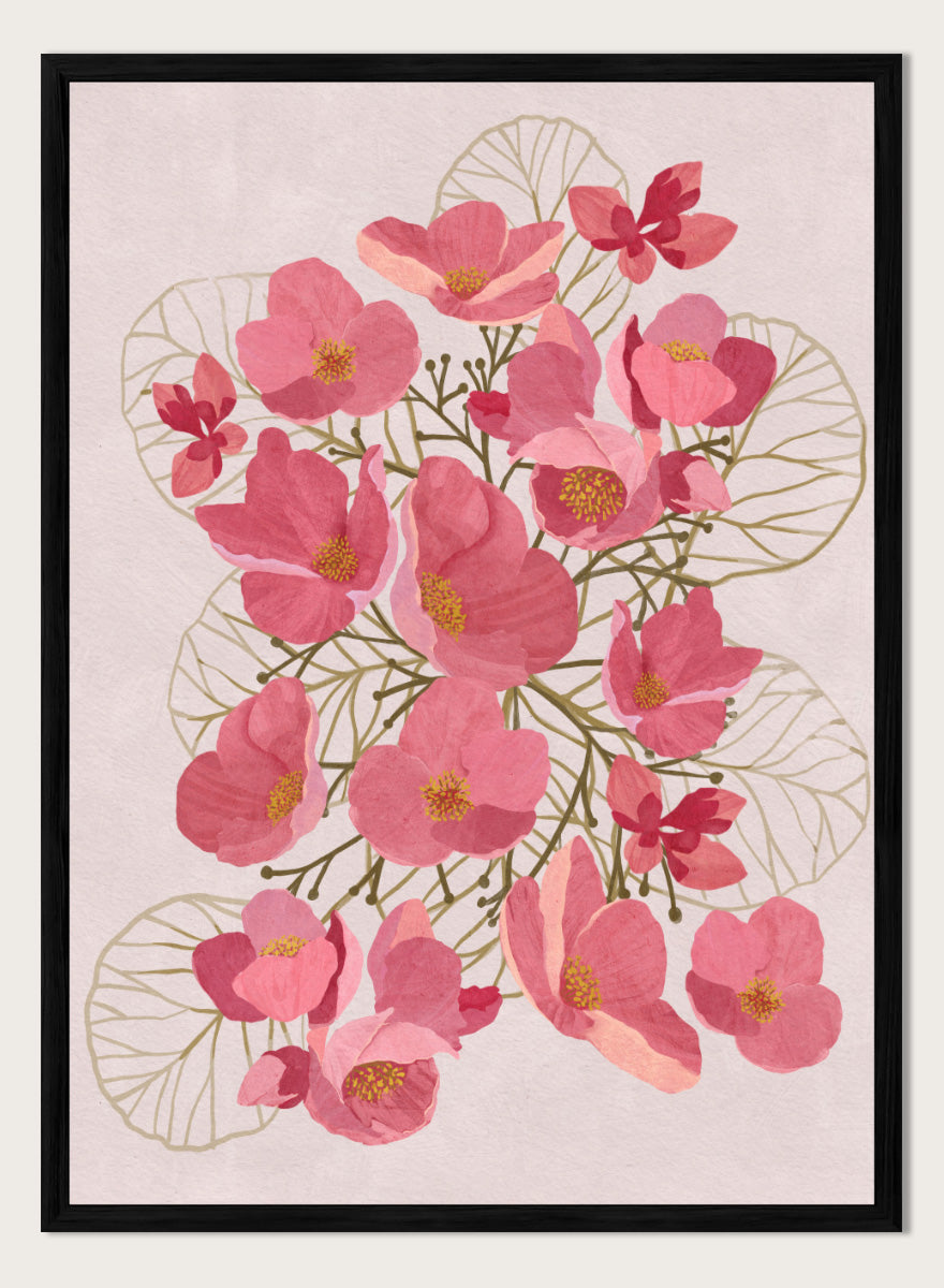 A framed botanical art print featuring pink flowers with yellow centers and delicate gold leaf outlines on a pale pink background. Shop Japanese Quince Floral Art Print by Katie O&