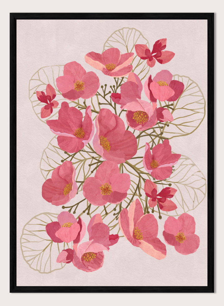 A framed botanical art print featuring pink flowers with yellow centers and delicate gold leaf outlines on a pale pink background. Shop Japanese Quince Floral Art Print by Katie O&