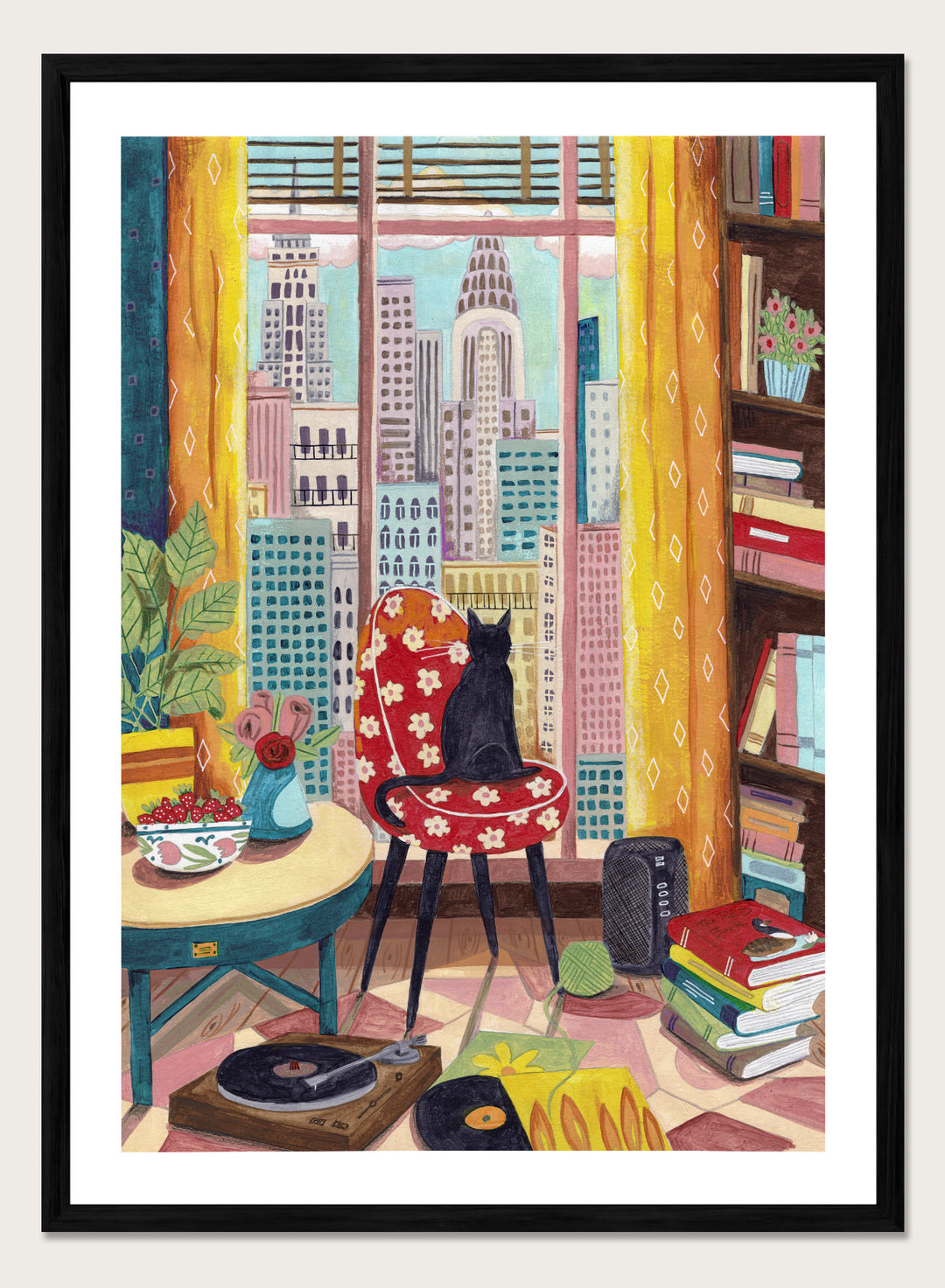 Colorful interior scene with a cat on a chair, books, and cityscape view. Black Cat City View by Caroline Bonne Müller is a fine art print and wall poster of a black cat by a window with city skyline and colorful interior.