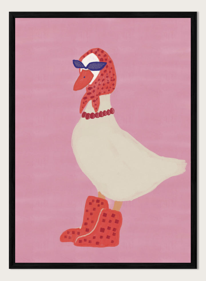 A stylized illustration of a white goose wearing a red patterned headscarf, blue sunglasses, a red beaded necklace, and red checkered boots, set against a solid pink background. Chic Goose Fashion by The Art Concept playful animal art print featuring a goose in sunglasses, a red headscarf, necklace, and bold red boots.
