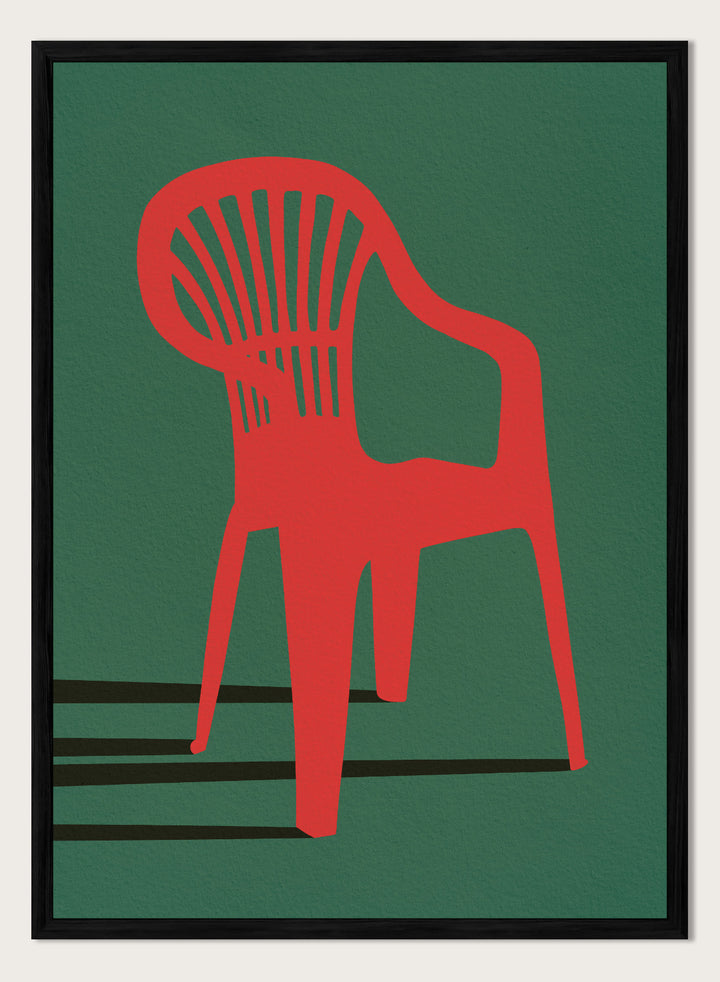 Bold Red Chair by Lisa Solomoniuk premium framed fine art print featuring a vivid red chair, deep green background, and long black shadows.