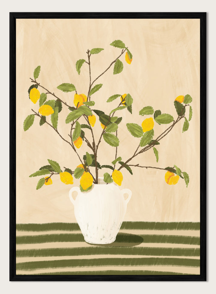 A framed still life artwork showing yellow lemons on leafy branches arranged in a white vase, set against a warm beige background with green horizontal stripes at the bottom. Lemon Tree Still Life by Lisa Solomoniuk premium framed fine art print featuring bright yellow lemons in a white vase on a striped green table.