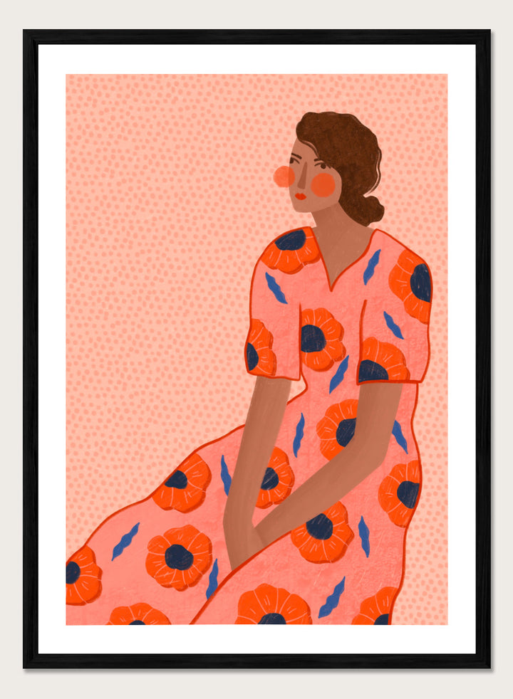 A stylized fashion illustration of a seated woman in a coral pink dress with large orange poppy motifs and blue leaf accents, shown with a white border and black frame. Stylish Poppy Portrait by Bea Müller floral woman art print featuring a pink dress covered in orange poppies and blue leaves for colorful modern wall decor.