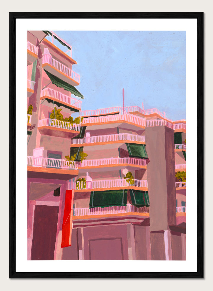 Shop Pink City Balconies by Sophia Novosel, a colorful city wall art print poster featuring pink apartment buildings, green awnings, balconies, and blue sky.