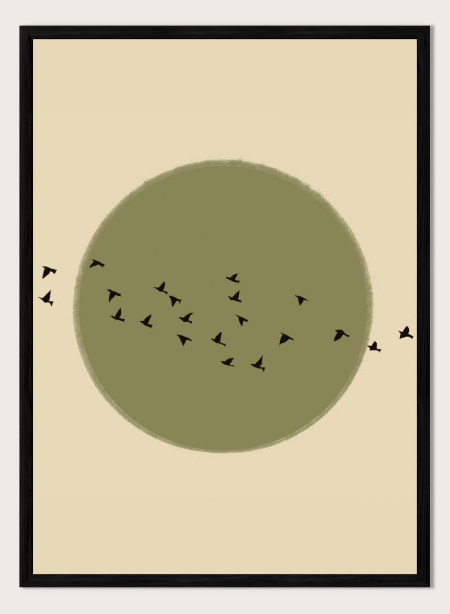 Minimalist art print featuring a large olive green circle with small black bird silhouettes flying across it, set against a warm beige background. Graceful Birds Soaring by The Art Concept is a minimalist bird art print featuring black birds in flight across an olive green circle and warm cream background.