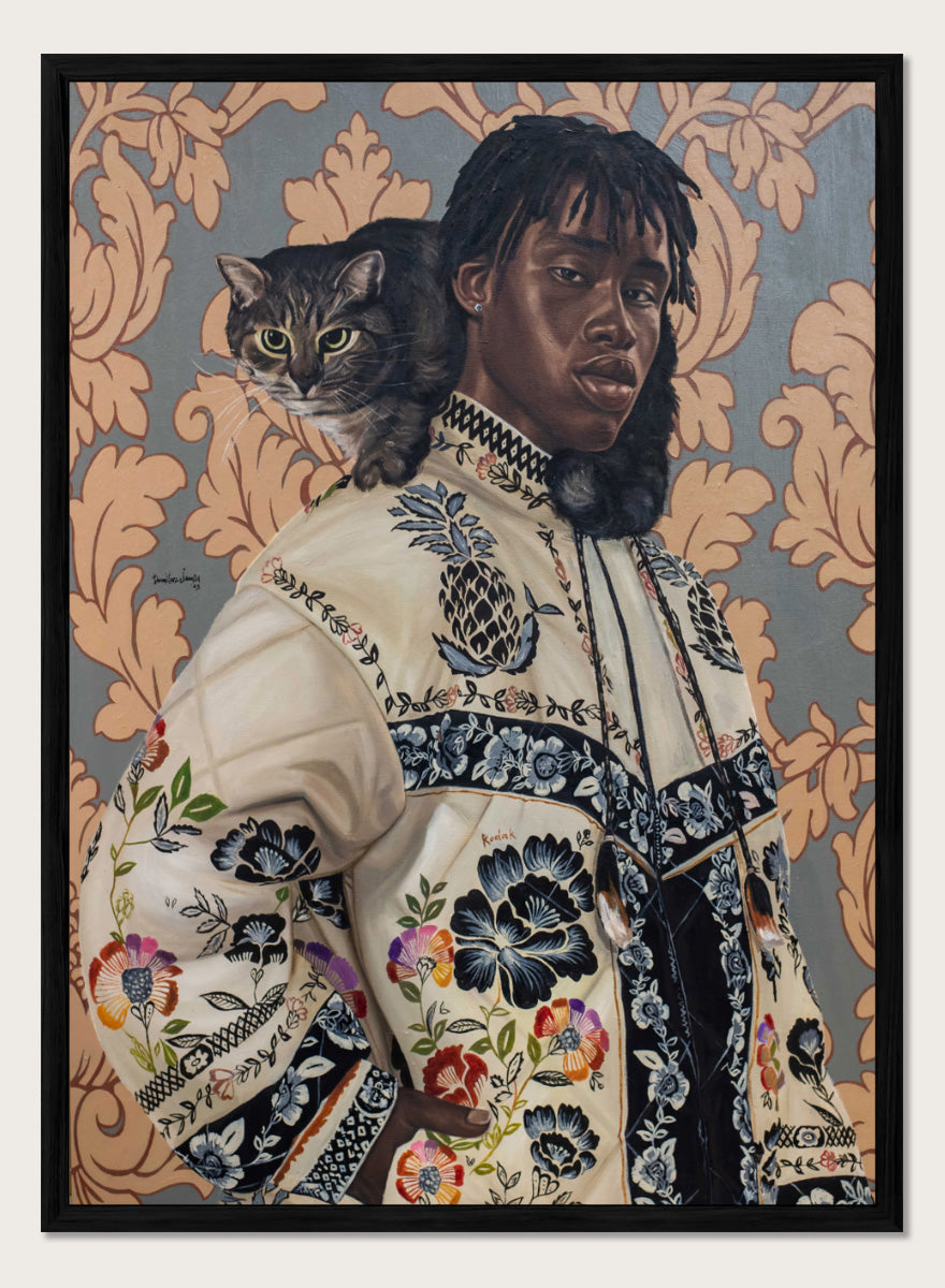 A stylized portrait painting of a Black man wearing an ornate cream jacket with colorful floral embroidery, seated against a patterned wallpaper background with a gray tabby cat on his shoulder. Shop Man and Cat Portrait by Damilare Jamiu, a contemporary figurative wall art print featuring a man with a cat, embroidered clothing, and rich floral detail.