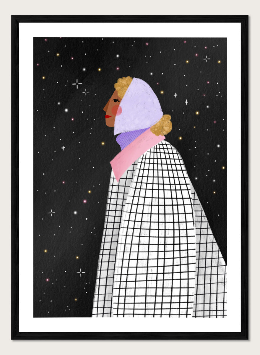 A framed art print featuring a stylized illustration of a woman in profile wearing a white and black checkered cape and a lavender headscarf against a black starry background. Shop Woman Under Starry Night by Bea Müller, a figurative wall art print poster featuring a contemplative woman beneath a star-filled black night sky.