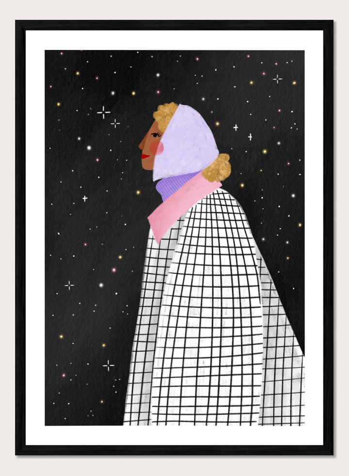 A framed art print featuring a stylized illustration of a woman in profile wearing a white and black checkered cape and a lavender headscarf against a black starry background. Shop Woman Under Starry Night by Bea Müller, a figurative wall art print poster featuring a contemplative woman beneath a star-filled black night sky.